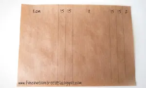 Carta da pacchi con linee tracciate e misure (8, 15, 15, 8, 15, 15, 2) per creare un modello busta lettera.