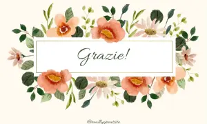 Un biglietto con fiori acquerellati e la scritta "Grazie!" al centro.