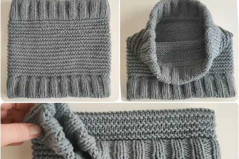 Dettagli di un scaldacollo uncinetto grigio, con coste e punto a maglia. Misure e texture visibili.