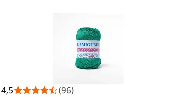 Gomitolo di filati amigurumi verde brillante, perfetto per creare giocattoli e decorazioni.