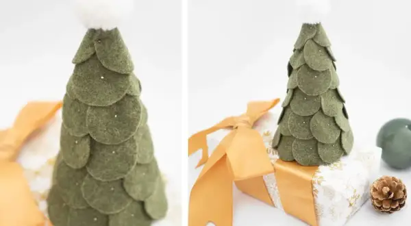Albero di Natale fatto a mano con cono polistirolo e feltro verde, decorato con pallina bianca e glitter. Perfetto per un tocco festivo.